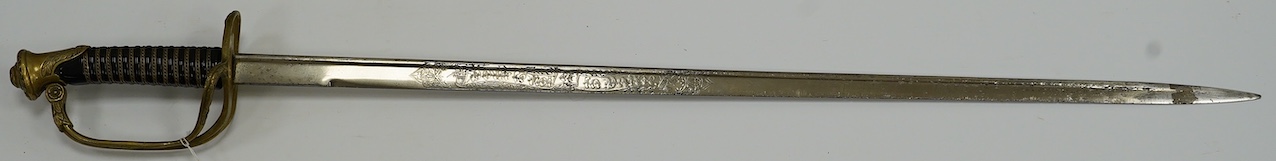 A Belgian WWI infantry officer’s pipeback sword, blade etched with crowned A ‘Albert I’ and ‘Pour le Roi et la Patrie’ with regulation brass hilt, blade 74.5cm. Condition - good